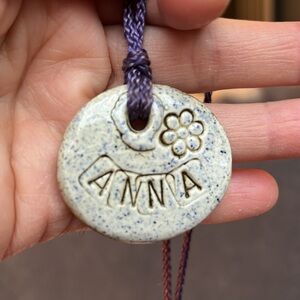 Clay glazed hand made necklace with name ANNA